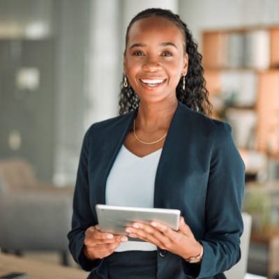 Portrait, lawyer and black woman with tablet, smile and happy in office workplace. African attorney, technology and face of professional, female advocate and legal advisor from Nigeria in law firm.